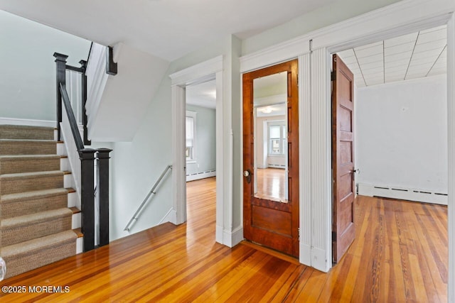 208 4th Ave, Belmar, NJ 07719 - entryway featuring a baseboard radiator, light wood-type flooring, and baseboards