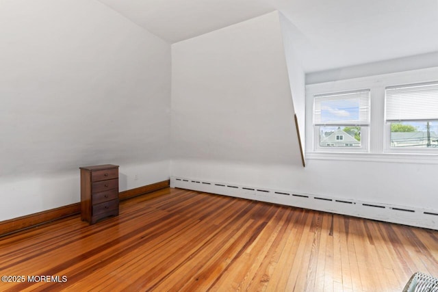 208 4th Ave, Belmar, NJ 07719 - bonus room with baseboard heating and hardwood / wood-style flooring