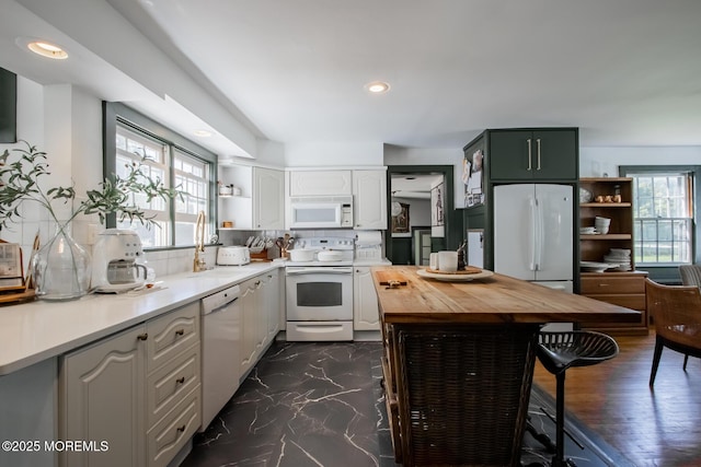 135 Rumson Rd, Rumson, NJ 07760 - kitchen featuring white appliances, open shelves, wood counters, tasteful backsplash, and recessed lighting