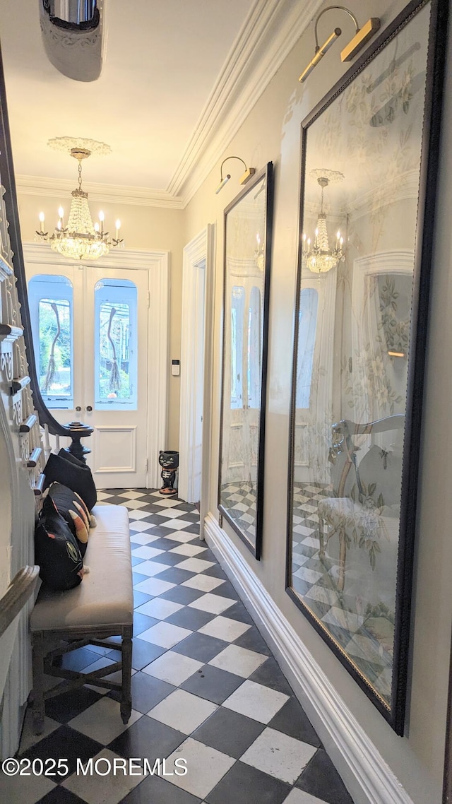 130 Main St, Keyport, NJ 07735 - entryway with a chandelier, tile patterned floors, crown molding, and baseboards