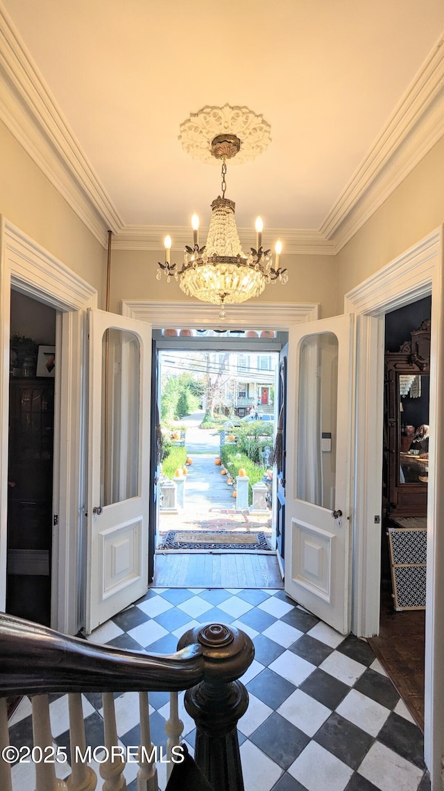 130 Main St, Keyport, NJ 07735 - foyer entrance featuring a chandelier, tile patterned floors, and crown molding