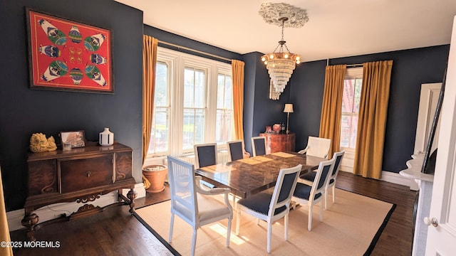 130 Main St, Keyport, NJ 07735 - dining room with a chandelier, wood finished floors, and baseboards