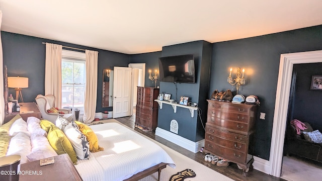 130 Main St, Keyport, NJ 07735 - bedroom with baseboards and wood finished floors