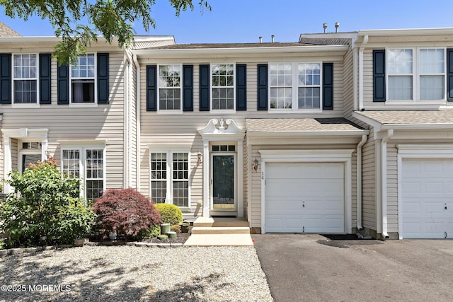 14 Osprey Ln Unit 72, Bayville, NJ 08721 - townhome / multi-family property with an attached garage and driveway
