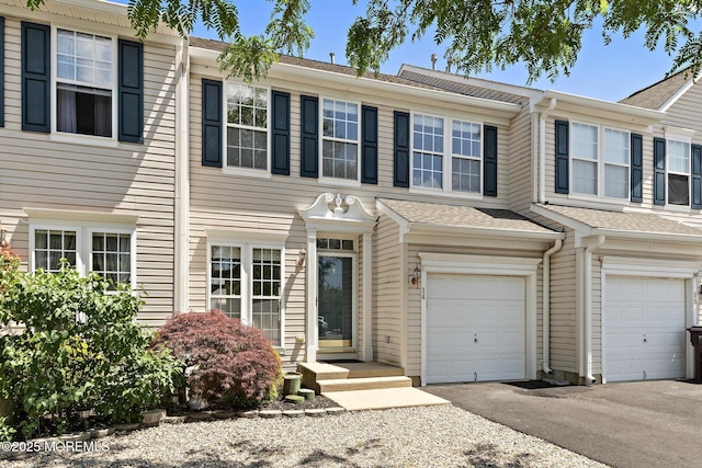 14 Osprey Ln Unit 72, Bayville, NJ 08721 - view of property with an attached garage and driveway