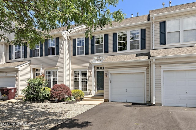 14 Osprey Ln Unit 72, Bayville, NJ 08721 - townhome / multi-family property featuring a garage, driveway, and roof with shingles