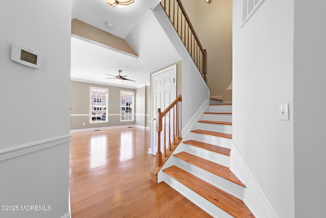 14 Osprey Ln Unit 72, Bayville, NJ 08721 - staircase featuring a ceiling fan, wood finished floors, and baseboards
