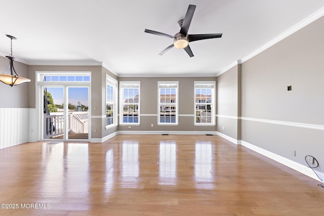 14 Osprey Ln Unit 72, Bayville, NJ 08721 - unfurnished living room featuring ceiling fan, light wood finished floors, ornamental molding, and baseboards
