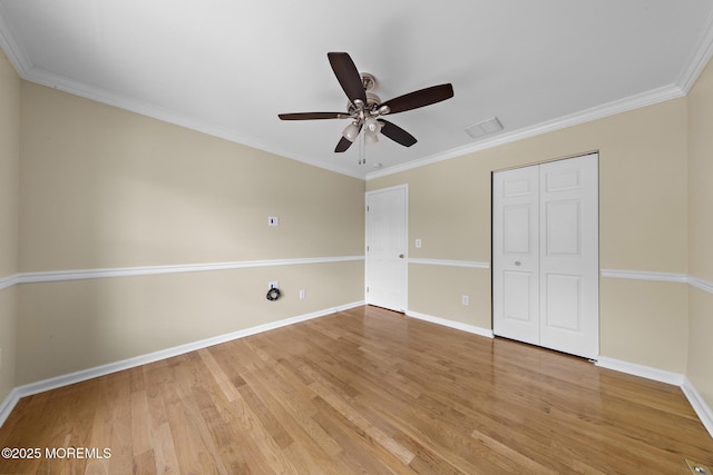 14 Osprey Ln Unit 72, Bayville, NJ 08721 - unfurnished bedroom with light wood-style floors, baseboards, a closet, crown molding, and ceiling fan