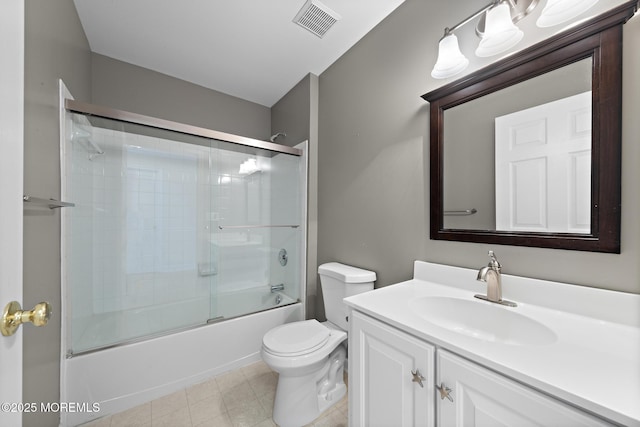 14 Osprey Ln Unit 72, Bayville, NJ 08721 - bathroom featuring toilet, vanity, combined bath / shower with glass door, and tile patterned floors