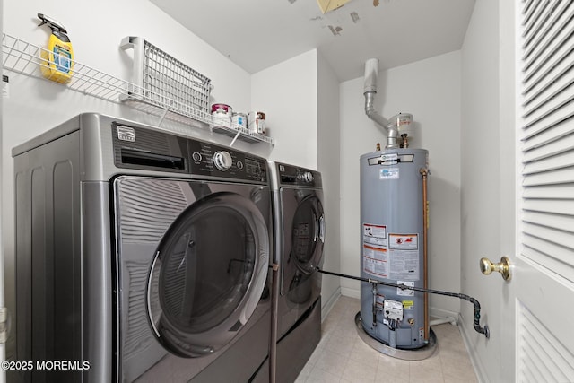14 Osprey Ln Unit 72, Bayville, NJ 08721 - laundry area with water heater, independent washer and dryer, baseboards, and light tile patterned flooring