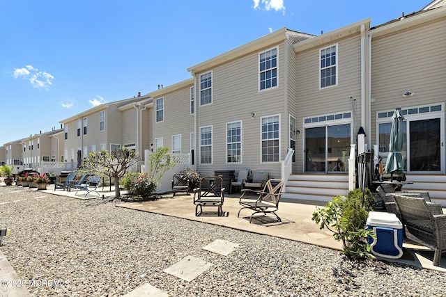 14 Osprey Ln Unit 72, Bayville, NJ 08721 - back of house featuring a residential view, a patio area, and entry steps