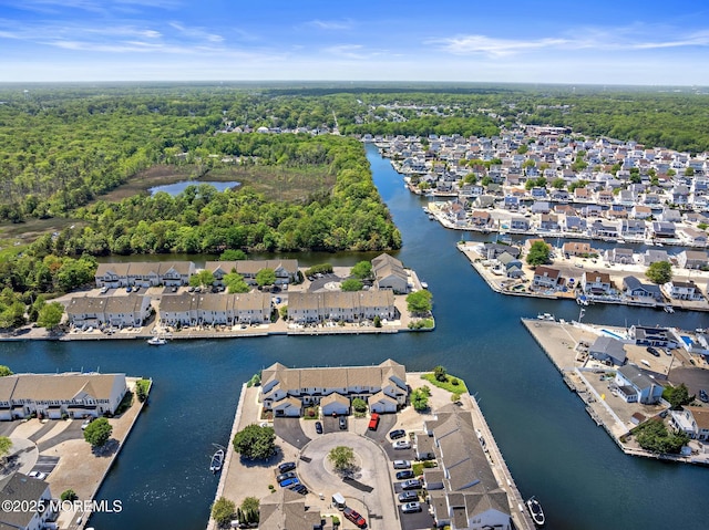 14 Osprey Ln Unit 72, Bayville, NJ 08721 - aerial overview of property's location with nearby suburban area, a nearby body of water, and a heavily wooded area