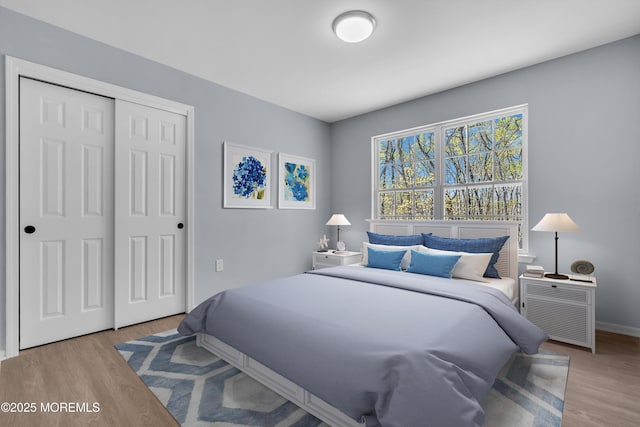 19 Hillside Ave, Barnegat, NJ 08005 - bedroom featuring wood finished floors, a closet, and baseboards