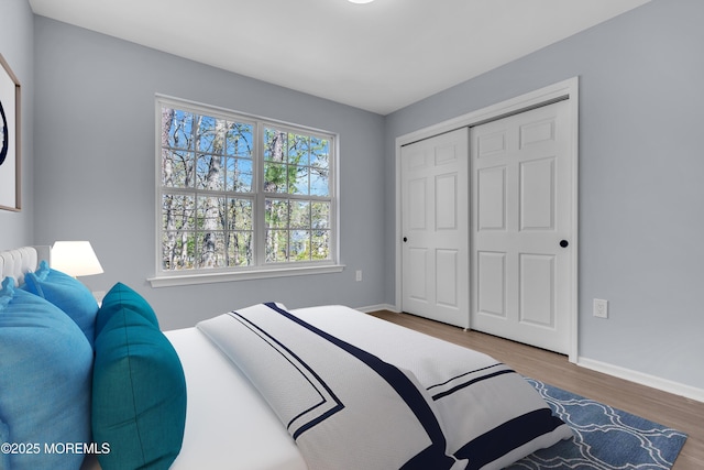 19 Hillside Ave, Barnegat, NJ 08005 - bedroom with wood finished floors, baseboards, and a closet