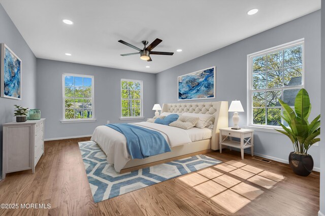 19 Hillside Ave, Barnegat, NJ 08005 - bedroom featuring multiple windows, baseboards, wood finished floors, recessed lighting, and ceiling fan
