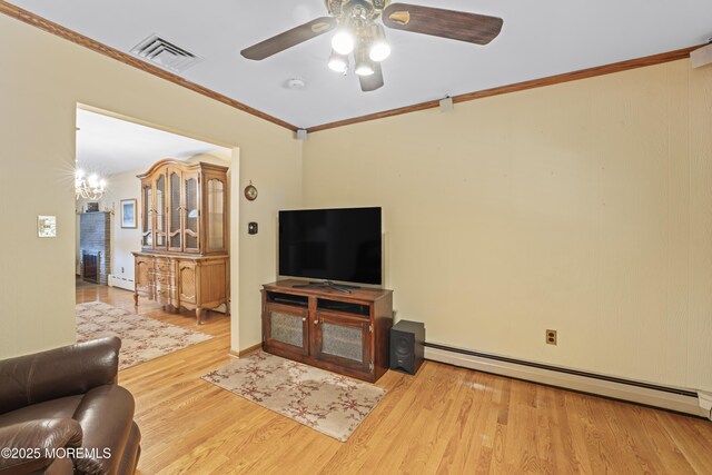 66 Westover Ave, West Caldwell, NJ 07006 - living room with a ceiling fan, a baseboard radiator, ornamental molding, wood finished floors, and a chandelier