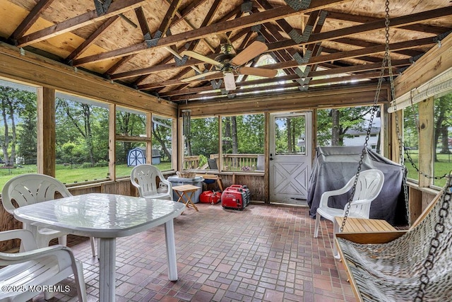 2 Merrick Ct, Middletown, NJ 07748 - sunroom with vaulted ceiling, a ceiling fan, and view of wooded area