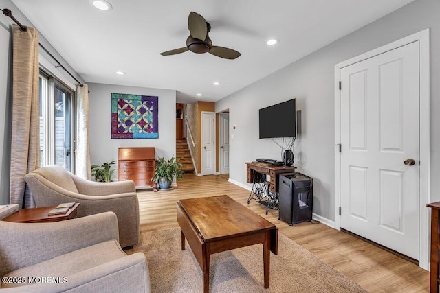2 Merrick Ct, Middletown, NJ 07748 - living room with ceiling fan, recessed lighting, baseboards, light wood-style flooring, and stairway