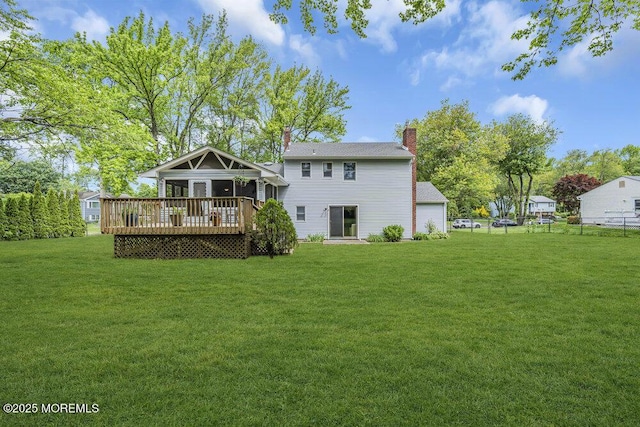 2 Merrick Ct, Middletown, NJ 07748 - rear view of house featuring a wooden deck and a chimney