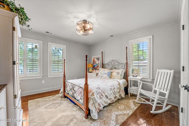 68 Seneca Pl, Oceanport, NJ 07757 - bedroom with multiple windows, crown molding, light wood-style flooring, and baseboards
