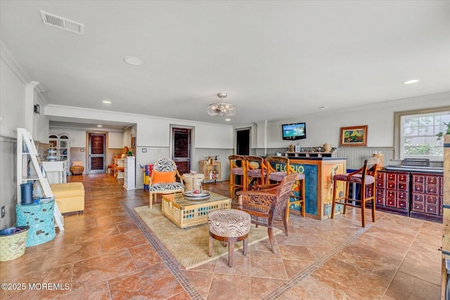 68 Seneca Pl, Oceanport, NJ 07757 - living room featuring crown molding, wainscoting, and recessed lighting