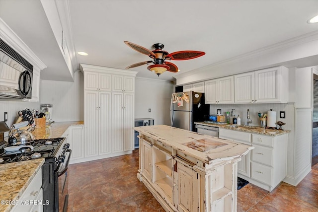 68 Seneca Pl, Oceanport, NJ 07757 - kitchen featuring black appliances, ceiling fan, a sink, recessed lighting, and light stone countertops