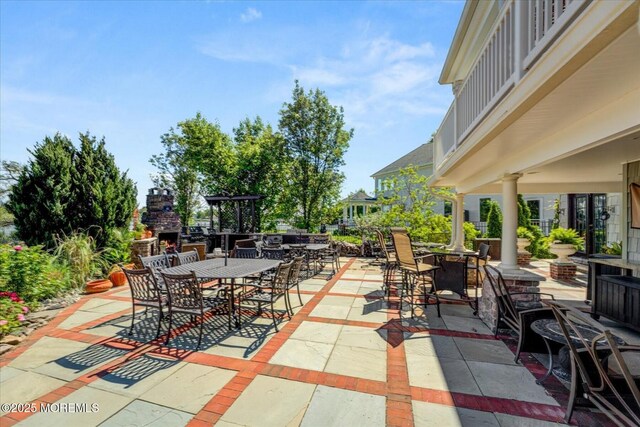 68 Seneca Pl, Oceanport, NJ 07757 - view of patio / terrace featuring outdoor dining space and an outdoor stone fireplace