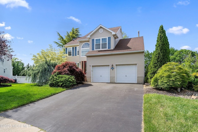 6 Palmer Ln, Englishtown, NJ 07726 - view of front facade featuring driveway and a garage