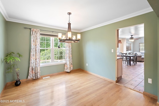 6 Palmer Ln, Englishtown, NJ 07726 - empty room featuring a chandelier, ornamental molding, baseboards, wood finished floors, and ceiling fan