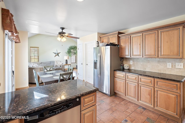6 Palmer Ln, Englishtown, NJ 07726 - kitchen with stainless steel appliances, a ceiling fan, backsplash, dark stone countertops, and brown cabinets