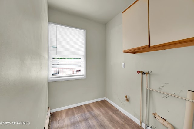 90 Dock Rd, Brick, NJ 08723 - laundry room featuring cabinet space and light wood finished floors