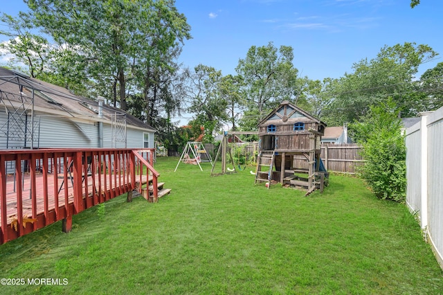 90 Dock Rd, Brick, NJ 08723 - fenced backyard with a playground and a wooden deck