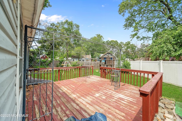 90 Dock Rd, Brick, NJ 08723 - wooden terrace featuring a fenced backyard and a playground
