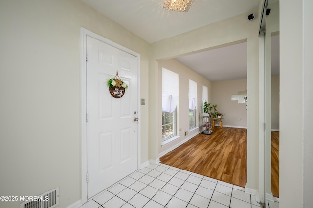 14 Winfield Dr, Manalapan, NJ 07726 - foyer with baseboards and light tile patterned flooring