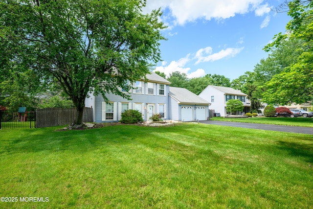 14 Winfield Dr, Manalapan, NJ 07726 - view of front facade featuring driveway and a garage