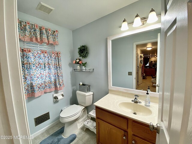 8 Augusta St, Wrightstown, NJ 08562 - bathroom featuring tile patterned floors, toilet, vanity, and baseboards