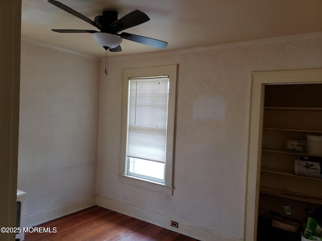 266 Albert Pl, Elberon, NJ 07740 - unfurnished room with wood finished floors, ornamental molding, and ceiling fan