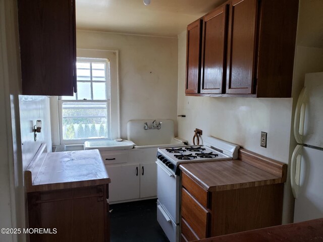 266 Albert Pl, Elberon, NJ 07740 - kitchen featuring white appliances and crown molding
