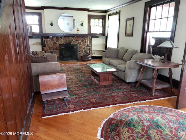 266 Albert Pl, Elberon, NJ 07740 - living area featuring crown molding, wood finished floors, and a fireplace