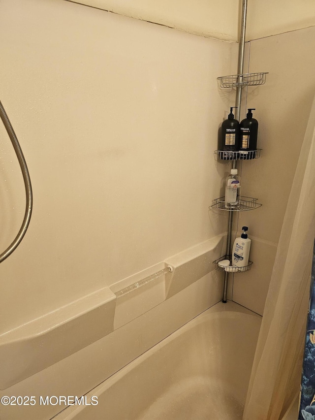 906 Egret Dr, Toms River, NJ 08753 - full bathroom with a bathtub and a shower with curtain