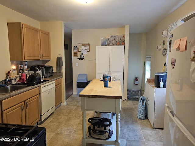 906 Egret Dr, Toms River, NJ 08753 - kitchen with white appliances, a sink, a kitchen island, and wood counters