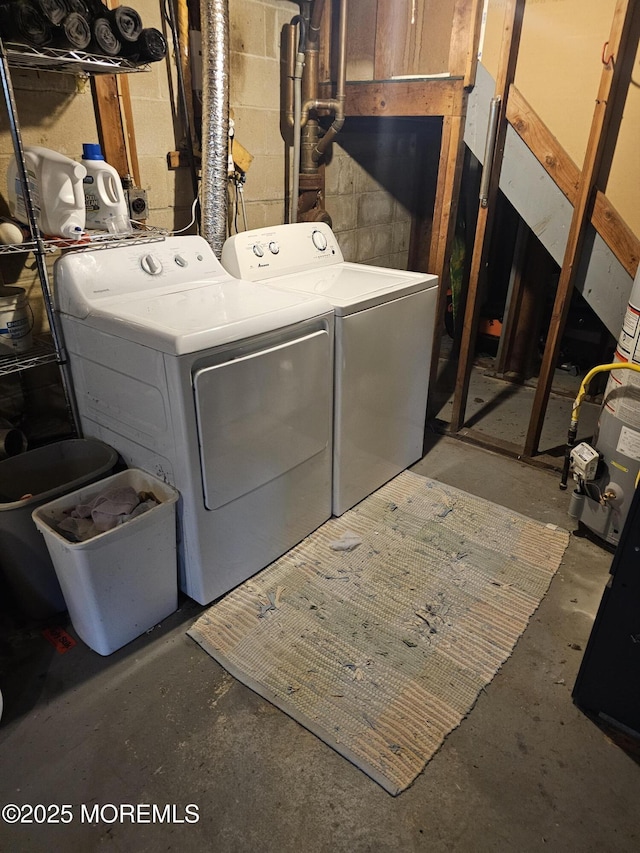 906 Egret Dr, Toms River, NJ 08753 - laundry area with independent washer and dryer and concrete block wall