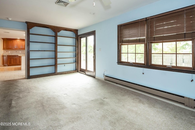 153 12th St, Belford, NJ 07718 - spare room with a baseboard radiator, light carpet, a ceiling fan, and a smoke detector