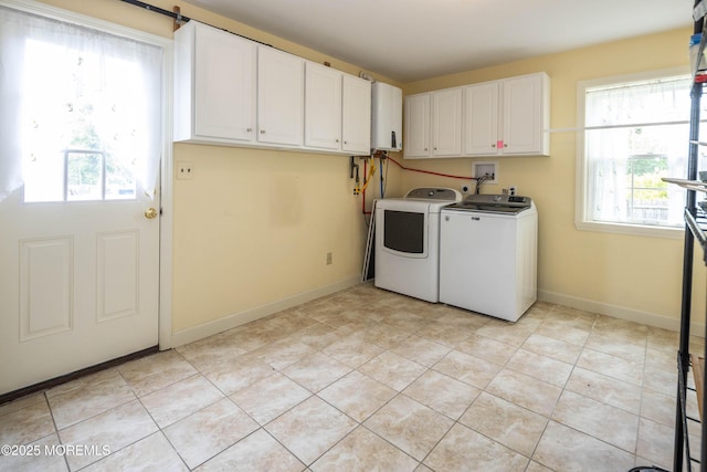 153 12th St, Belford, NJ 07718 - washroom featuring cabinet space, separate washer and dryer, baseboards, and light tile patterned floors