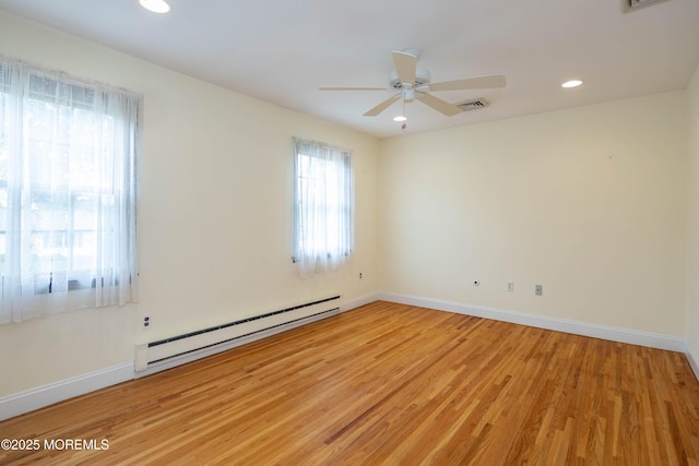 153 12th St, Belford, NJ 07718 - unfurnished room with baseboard heating, light wood finished floors, baseboards, ceiling fan, and recessed lighting