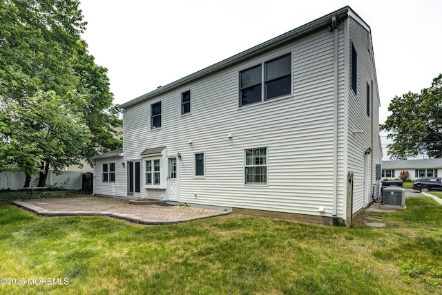 153 12th St, Belford, NJ 07718 - back of property with a yard, a patio, and central AC unit