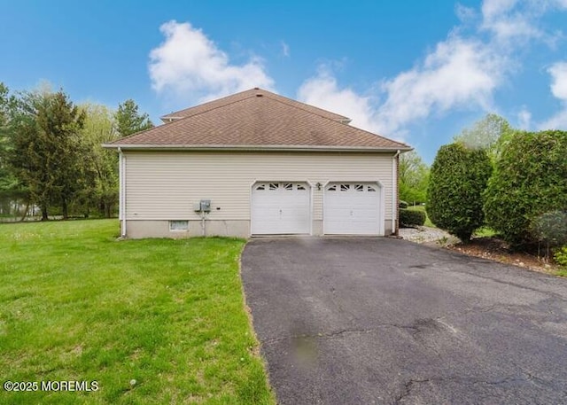 1 Alexander Dr, Monroe, NJ 08831 - view of side of home with asphalt driveway, a yard, and an attached garage