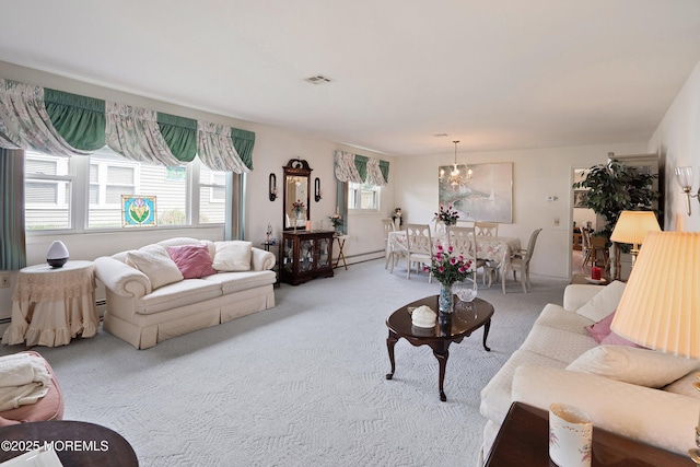 14 Tijuana Ct, Toms River, NJ 08757 - carpeted living room featuring healthy amount of natural light, a chandelier, and baseboard heating