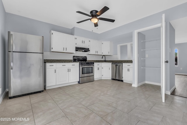 127 Creek Rd Unit 518, Brick, NJ 08724 - kitchen featuring stainless steel appliances, a ceiling fan, white cabinetry, under cabinet range hood, and a sink
